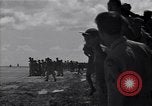 Image of B-29 bomber landing Saipan Northern Mariana Islands, 1944, second 26 stock footage video 65675036186