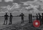 Image of B-29 bomber landing Saipan Northern Mariana Islands, 1944, second 31 stock footage video 65675036186