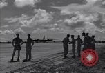 Image of B-29 bomber landing Saipan Northern Mariana Islands, 1944, second 33 stock footage video 65675036186
