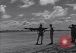 Image of B-29 bomber landing Saipan Northern Mariana Islands, 1944, second 36 stock footage video 65675036186