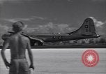 Image of B-29 bomber landing Saipan Northern Mariana Islands, 1944, second 45 stock footage video 65675036186