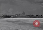Image of B-29 bomber landing Saipan Northern Mariana Islands, 1944, second 49 stock footage video 65675036186