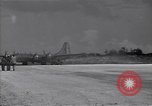 Image of B-29 bomber landing Saipan Northern Mariana Islands, 1944, second 56 stock footage video 65675036186