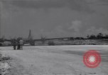 Image of B-29 bomber landing Saipan Northern Mariana Islands, 1944, second 61 stock footage video 65675036186