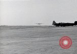 Image of damaged PB-4Y-1 plane Iwo Jima, 1945, second 1 stock footage video 65675036214