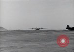 Image of damaged PB-4Y-1 plane Iwo Jima, 1945, second 6 stock footage video 65675036214