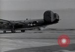 Image of damaged PB-4Y-1 plane Iwo Jima, 1945, second 12 stock footage video 65675036214