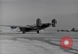 Image of damaged PB-4Y-1 plane Iwo Jima, 1945, second 13 stock footage video 65675036214