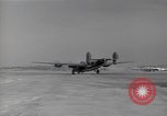 Image of damaged PB-4Y-1 plane Iwo Jima, 1945, second 14 stock footage video 65675036214
