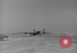 Image of damaged PB-4Y-1 plane Iwo Jima, 1945, second 15 stock footage video 65675036214