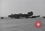 Image of damaged PB-4Y-1 plane Iwo Jima, 1945, second 23 stock footage video 65675036214