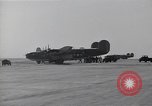 Image of damaged PB-4Y-1 plane Iwo Jima, 1945, second 24 stock footage video 65675036214