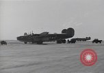Image of damaged PB-4Y-1 plane Iwo Jima, 1945, second 25 stock footage video 65675036214