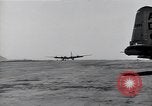 Image of landing of B-29 bombers Iwo Jima, 1945, second 32 stock footage video 65675036216