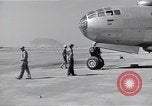 Image of B-29 bomber repaired Iwo Jima, 1945, second 10 stock footage video 65675036224