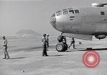 Image of B-29 bomber repaired Iwo Jima, 1945, second 11 stock footage video 65675036224