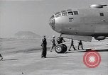 Image of B-29 bomber repaired Iwo Jima, 1945, second 12 stock footage video 65675036224