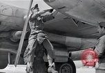 Image of B-29 bomber repaired Iwo Jima, 1945, second 50 stock footage video 65675036224