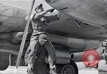 Image of B-29 bomber repaired Iwo Jima, 1945, second 51 stock footage video 65675036224