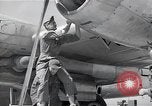Image of B-29 bomber repaired Iwo Jima, 1945, second 52 stock footage video 65675036224