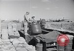 Standbild Besatzungsmitglieder Saipan Nördliche Marianen, 1945, aus Sekunde 42 historischem Filmmaterial Videoclip 65675036230