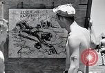 Standbild USA Airmen Saipan Nördliche Marianen, 1945, aus Sekunde 60 historischem Filmmaterial Videoclip 65675036232