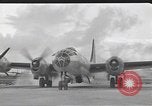 Standbild B-29 Bomber take off Saipan Nördliche Marianen, 1944, aus Sekunde 11 historischem Filmmaterial Videoclip 65675036242