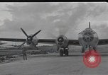 Standbild B-29 Bomber take off Saipan Nördliche Marianen, 1944, aus Sekunde 16 historischem Filmmaterial Videoclip 65675036242