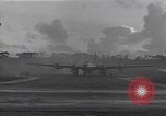 Standbild B-29 Bomber take off Saipan Nördliche Marianen, 1944, aus Sekunde 53 historischem Filmmaterial Videoclip 65675036242