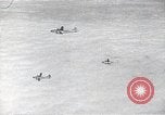 Image of B-29 bombers flying above ocean Nagoya Japan, 1945, second 7 stock footage video 65675036243
