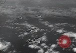 Image of B-29 bombers flying above ocean Nagoya Japan, 1945, second 13 stock footage video 65675036243