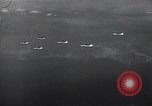 Image of B-29 bombers flying above ocean Nagoya Japan, 1945, second 15 stock footage video 65675036243