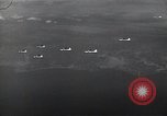 Image of B-29 bombers flying above ocean Nagoya Japan, 1945, second 18 stock footage video 65675036243