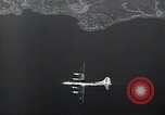 Image of B-29 bombers flying above ocean Nagoya Japan, 1945, second 26 stock footage video 65675036243