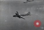 Image of B-29 bombers flying above ocean Nagoya Japan, 1945, second 37 stock footage video 65675036243