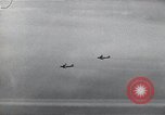 Image of B-29 bombers flying above ocean Nagoya Japan, 1945, second 45 stock footage video 65675036243