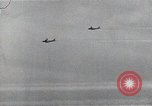 Image of B-29 bombers flying above ocean Nagoya Japan, 1945, second 49 stock footage video 65675036243