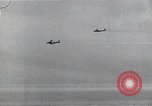 Image of B-29 bombers flying above ocean Nagoya Japan, 1945, second 50 stock footage video 65675036243