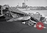 Standbild zerstörten amphibischen Handwerk Iwo Jima, 1945, aus Sekunde 4 historischem Filmmaterial Videoclip 65675036298