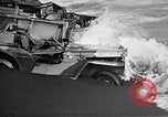 Standbild zerstörten amphibischen Handwerk Iwo Jima, 1945, aus Sekunde 57 historischem Filmmaterial Videoclip 65675036298