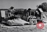 Image of Israeli soldiers prepare food Palestine, 1948, second 21 stock footage video 65675036309