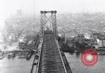 Image of Bridges and skyscrapers of New York in 1920s New York City USA, 1925, second 44 stock footage video 65675036355