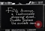 Image of Fifth Avenue shopping district New York City in 1920s New York City USA, 1925, second 5 stock footage video 65675036358