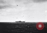 Image of Japanese kamikaze attacks on US Navy ships Pacific Ocean, 1945, second 1 stock footage video 65675036364
