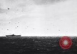 Image of Japanese kamikaze attacks on US Navy ships Pacific Ocean, 1945, second 3 stock footage video 65675036364