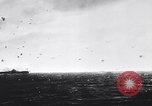 Image of Japanese kamikaze attacks on US Navy ships Pacific Ocean, 1945, second 4 stock footage video 65675036364