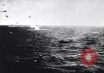 Image of Japanese kamikaze attacks on US Navy ships Pacific Ocean, 1945, second 5 stock footage video 65675036364