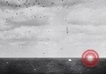 Image of Japanese kamikaze attacks on US Navy ships Pacific Ocean, 1945, second 20 stock footage video 65675036364