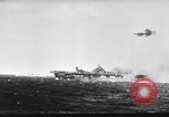 Image of Japanese kamikaze attacks on US Navy ships Pacific Ocean, 1945, second 48 stock footage video 65675036364