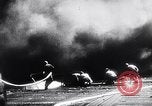 Image of Japanese kamikaze attacks on US Navy ships Pacific Ocean, 1945, second 50 stock footage video 65675036364